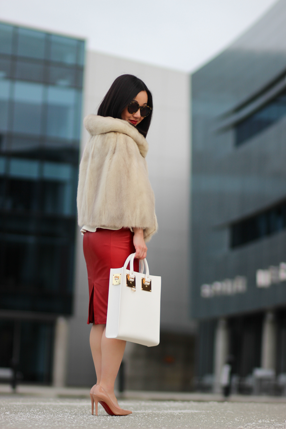 SOPHIE HULME mini tote in white | CHRISTIAN LOUBOUTIN Pigalle pumps | DANIER leather skirt | VINTAGE fur cape | KAREN WALKER super duper sunnies | Jenny Liu, style blogger