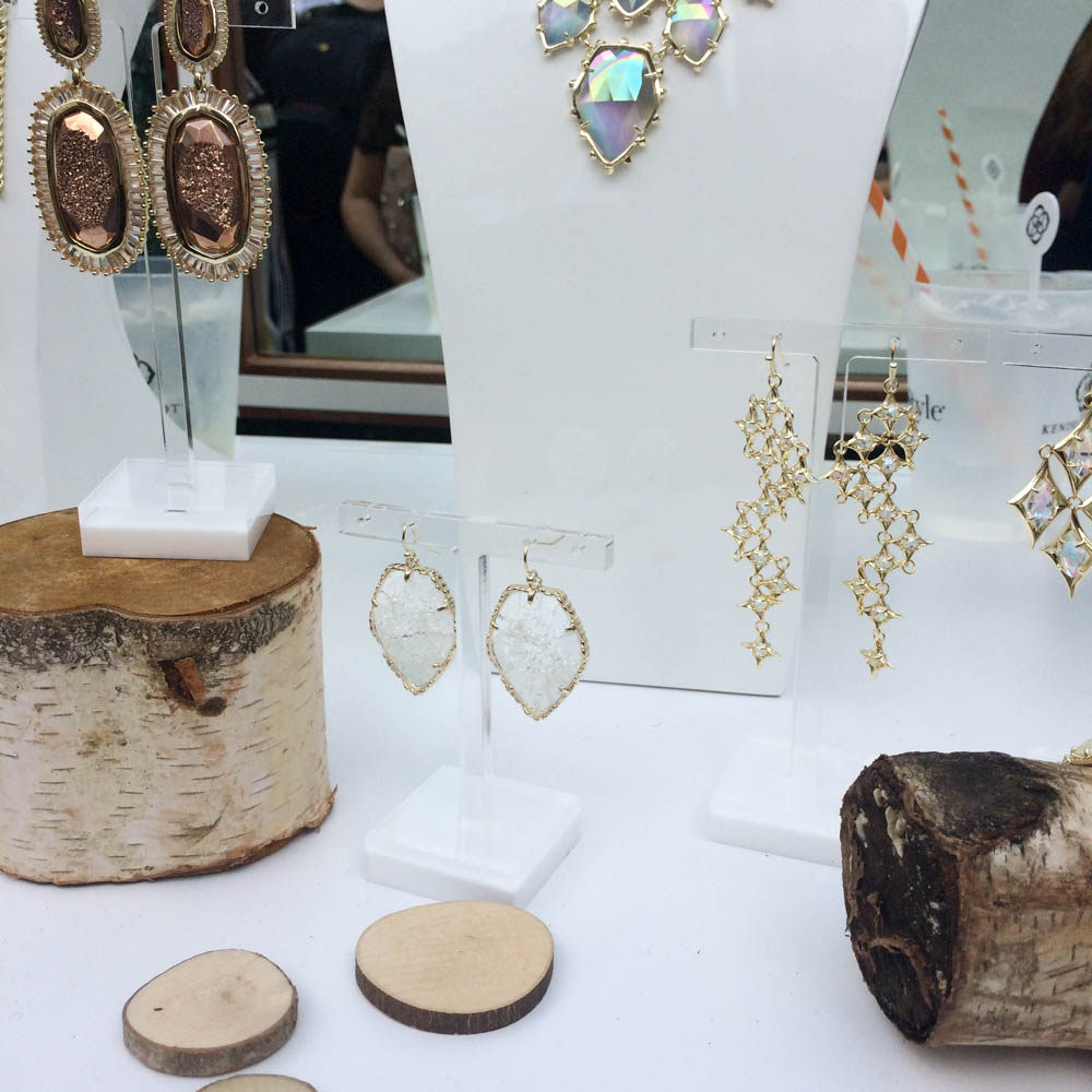 Pretty jewels at the Kendra Scott display, including the Kaki Baguette Earrings in rose gold drusy on the left.
