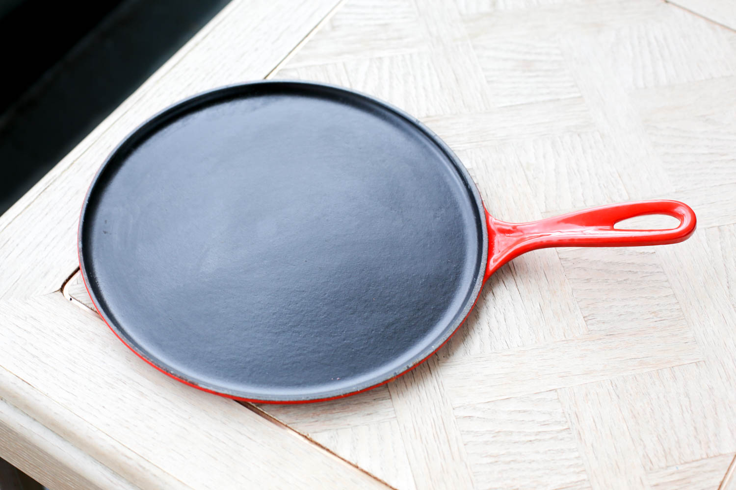 Le Creuset cast-iron crepe pan. Comes with a wooden rake, spatula, and several crepe recipes. Available at Amazon and Sur La Table.