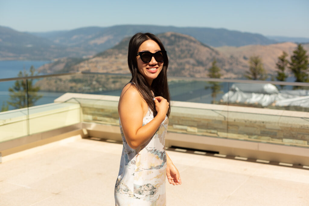 Blogger at Sparking Hill resort in Vernon. Wearing Le Specs Air Heart sunglasses and Artizia halter dress.